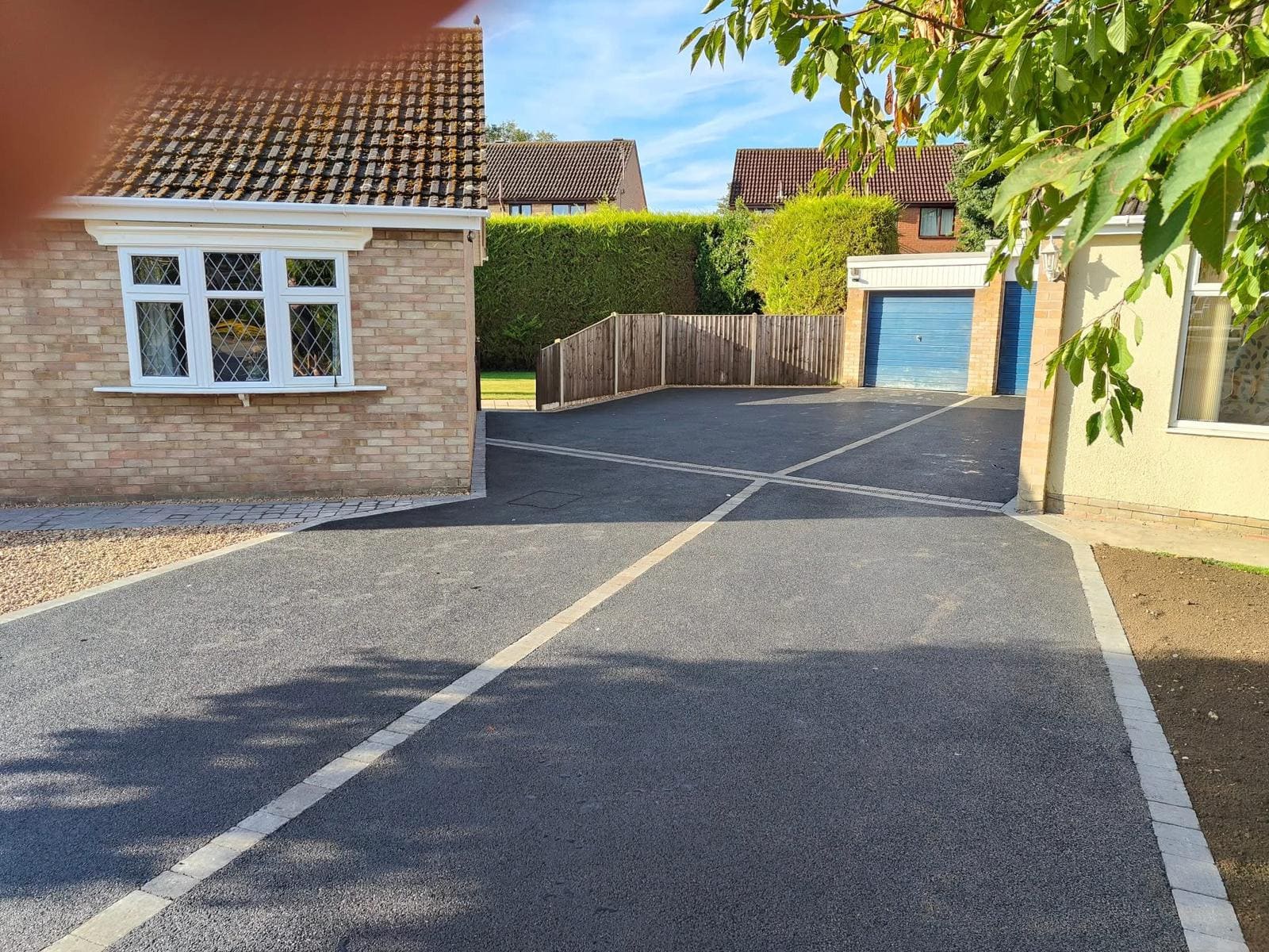 Tarmac driveway with block paving border at Scottish residential property